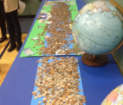 Girls Scouts in Carmel IN gather coins to create a river of change